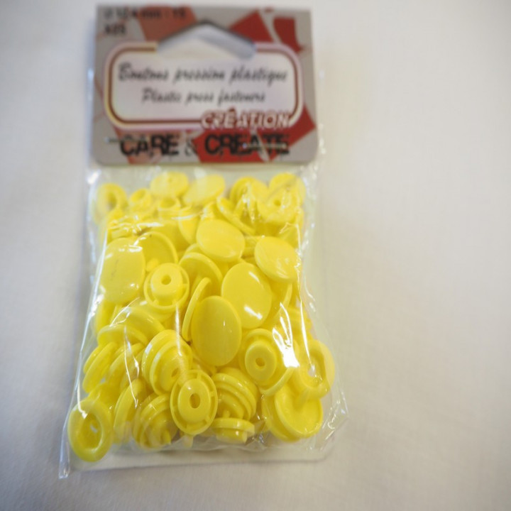 Boutons pressions plastique jaune